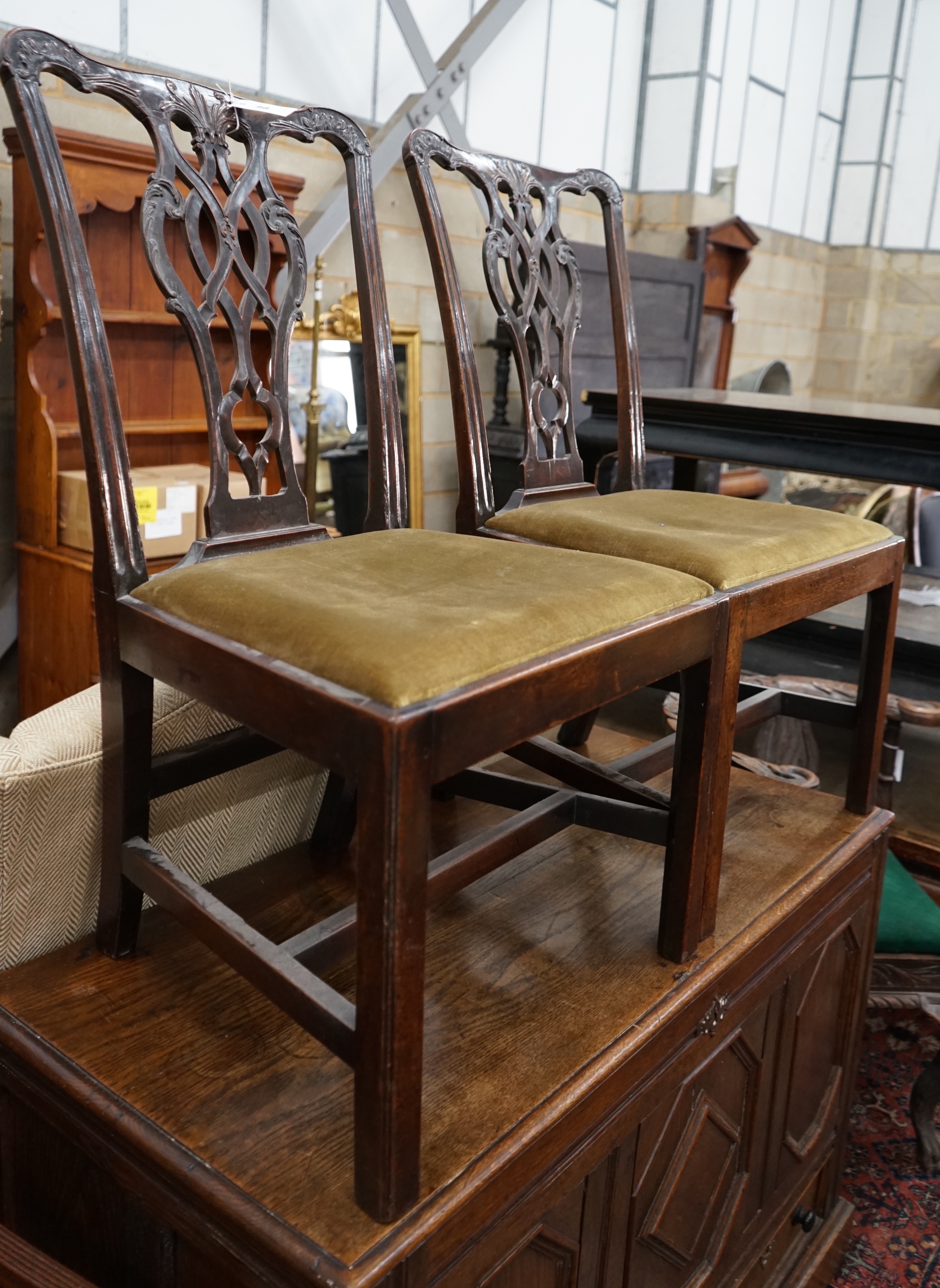 A pair of George III mahogany dining chairs